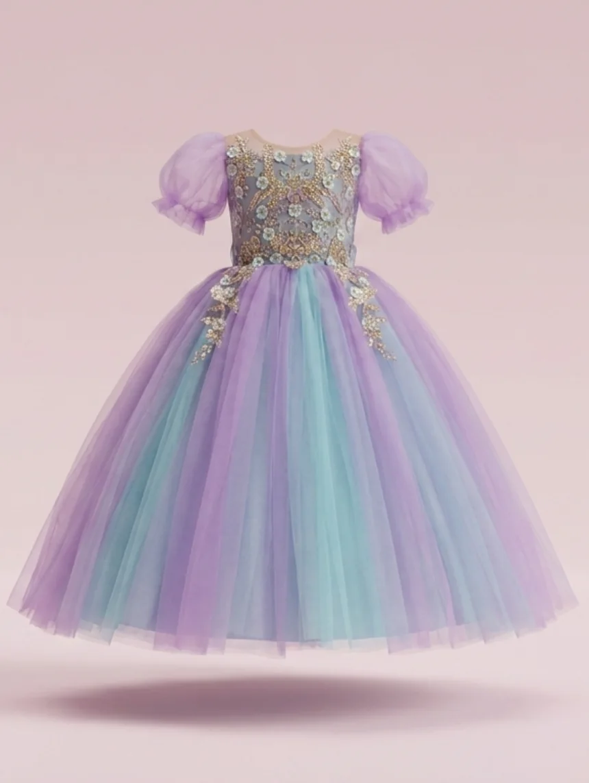 The finished handmade girls party dress, hand-beaded and hemmed, ready to wear